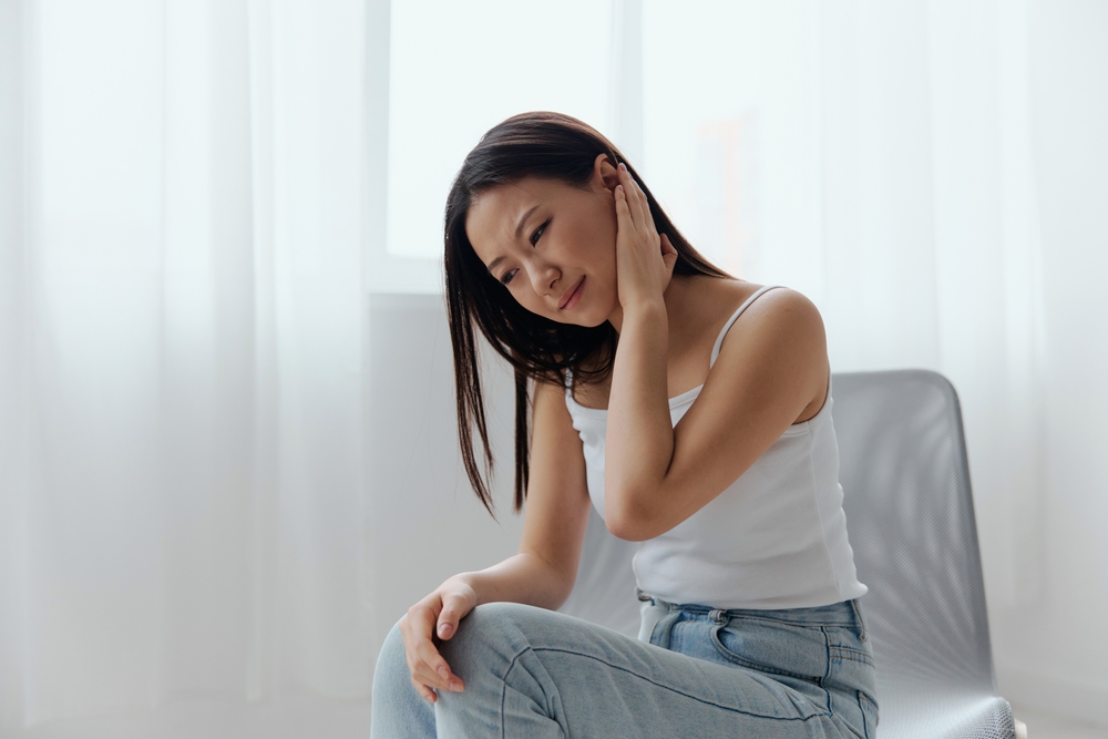 Girl with tinnitus.